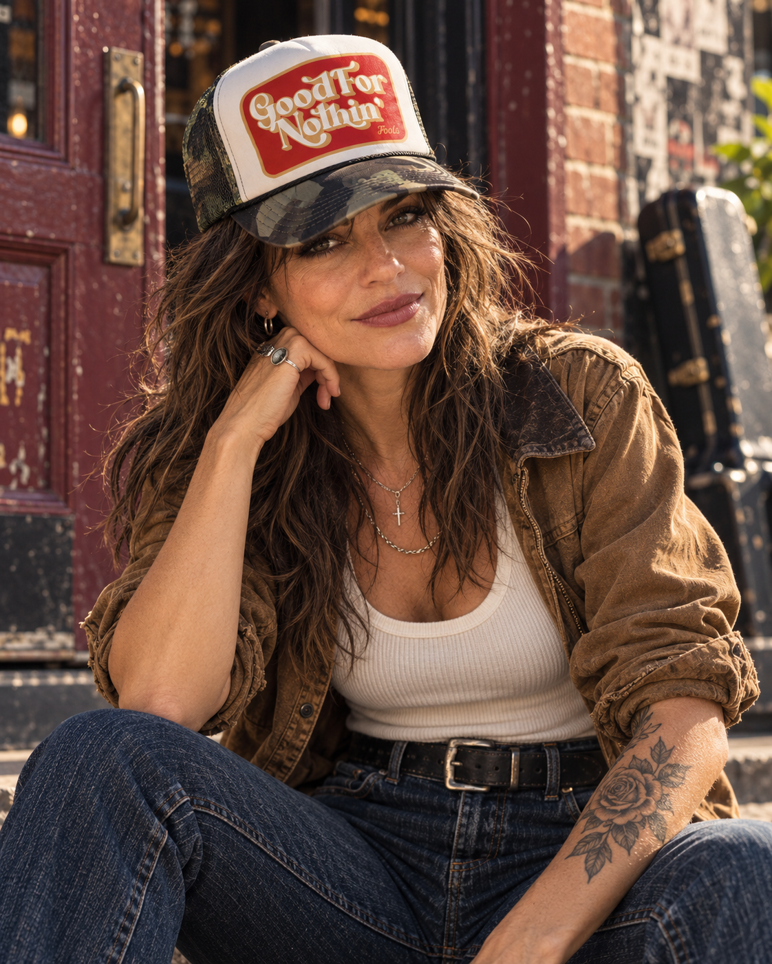 FOOLS Good For Nothin white and camouflage trucker hat styled with a worn canvas jacket, ivory ribbed tank and vintage denim.