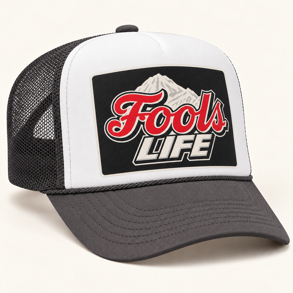 FOOLS Life Beer charcoal mesh and bill with white foam-front trucker hat, featuring flat red Fools LIFE mountain artwork.