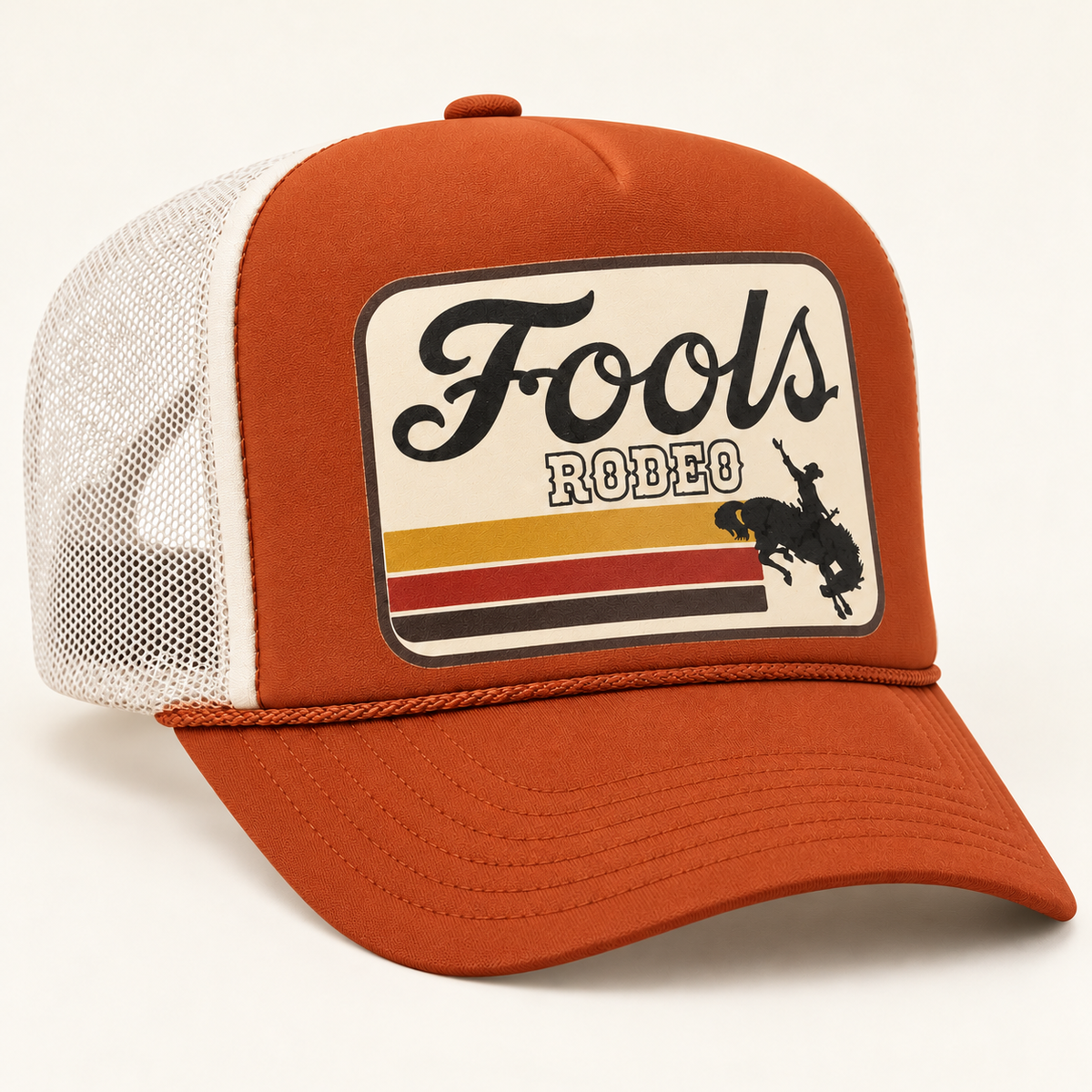 FOOLS Rodeo rust foam-front and white mesh Otto 39-165 trucker hat, three-quarter studio view.
