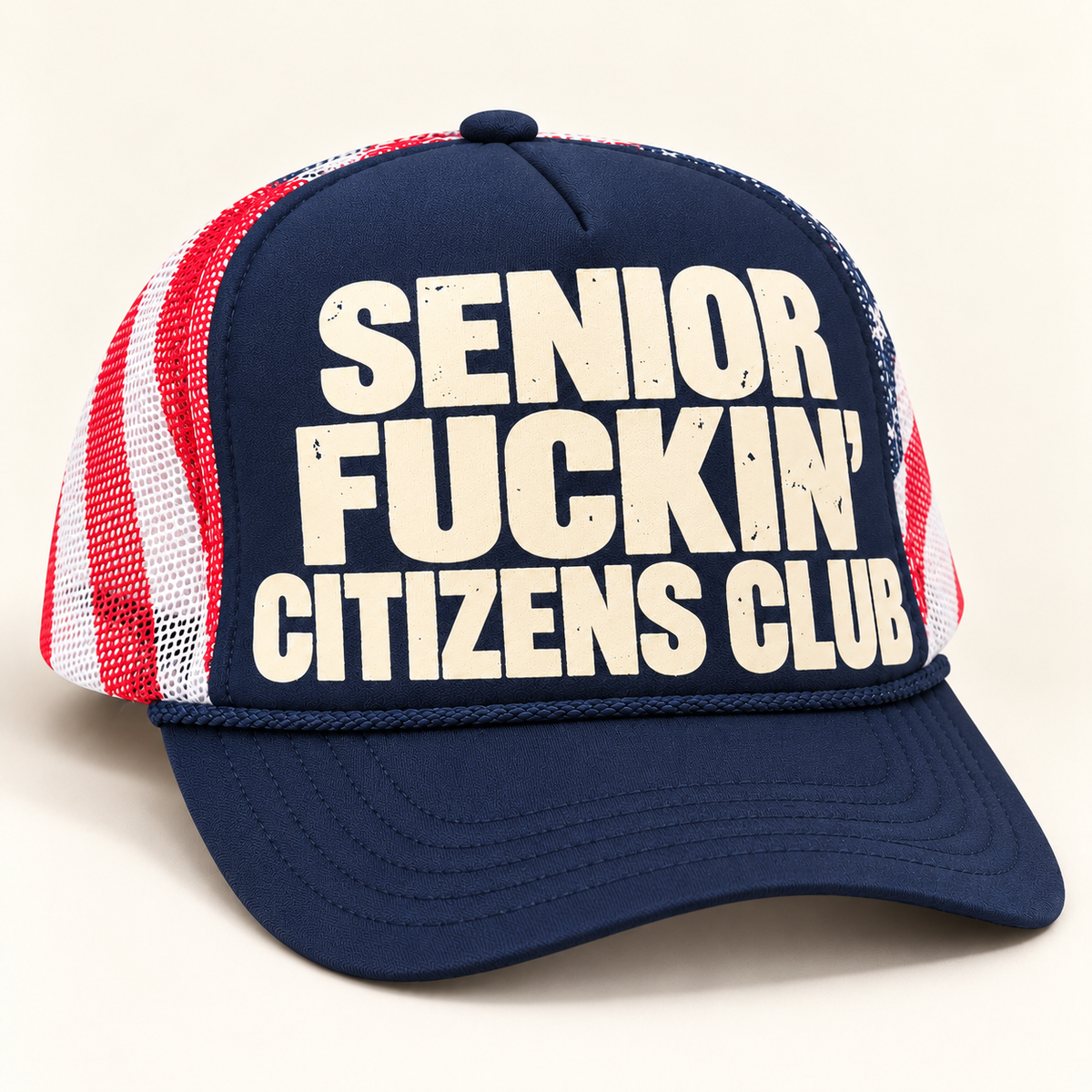 Three-quarter studio view of navy FOOLS Senior Fuckin’ Citizens Club trucker hat with striped mesh and cream distressed flat print.
